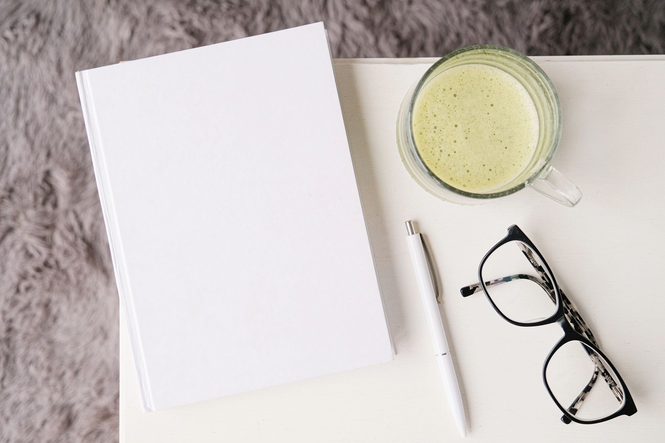 Minimal book mockup on a coffee table